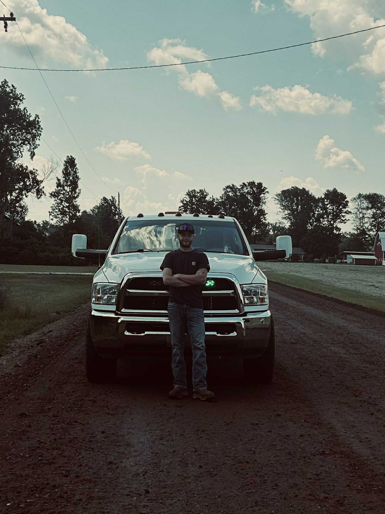 Skyler Jefferson with his dog and truck